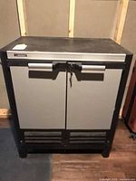 Front view of Husky cabinet closed showing overall condition