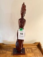 Front view of entire sculpture on base