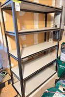 Full view of metal shelving unit front angle