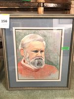 full view of framed pastel portrait