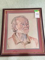 Full view of framed pastel portrait
