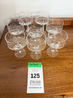 Eight crystal coupe glasses grouped