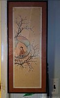 Full view of framed Asian themed wall art showing artwork, matting, and frame