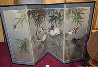 Front view of 4-panel screen fully opened showing artwork