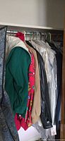 Closet rod with multiple jackets, shirt, garment bags