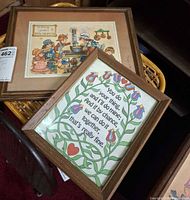 Both framed prints angled view