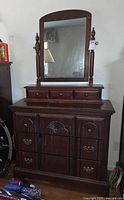 Full view of dresser showing mirror, top hutch, lower drawers