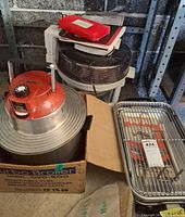 Group shot showing orange-topped Jet-Stream oven, Imarflex Turbo Broiler in box, Farberware broiler tray and rack