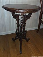 Full view of carved wood parlor table