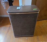 Front view of brown vinyl hamper