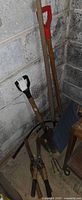 Corner view of shovels and shears