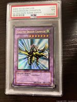 Front view of PSA-encased Gaia the Dragon Champion card showing label and artwork