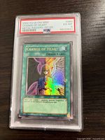 Front of PSA-slabbed Change of Heart card showing artwork, label, and grade