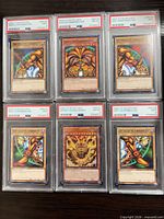 Six PSA-slabbed Exodia cards arranged in two rows