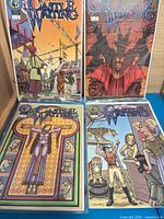 Four Castle Waiting issues showing varied cover art