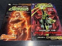 Front covers of both Green Lantern trade paperbacks