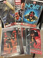 Front view showing Thanos Rising #1, Marvel NOW! Point One #1, Nova #1 plus Ultimate Adventures #3-6 and Nova #2 behind