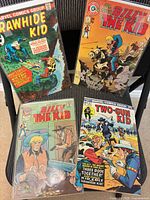 First image shows four comics: Rawhide Kid, two Billy the Kid issues, and Two-Gun Kid