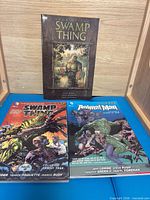 Front covers of all three trade paperbacks