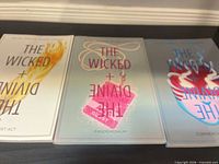 Front covers of all three volumes