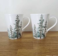 Front view of both Mikasa Watercolor Forest mugs