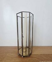 Full view with candle inserted showing octagonal brass and glass construction