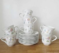 Stacked teacups atop saucers showing full set