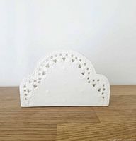 Front view of Skye McGhie Cream Lace porcelain napkin holder