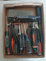 Overview of all hand tools and sharpening stone in box