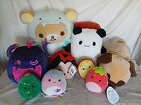 Group shot of all nine plush toys