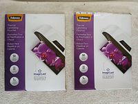 Front view of both sealed boxes showing brand, series, quantity and size