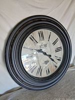 Front view of clock showing entire face and frame