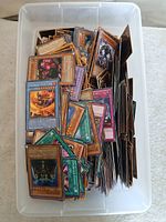 Top view of bin filled with loose Yu-Gi-Oh! cards