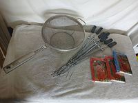 overall lot showing popper, skewers, packaged ponchos