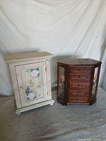 Both jewelry cabinets side by side