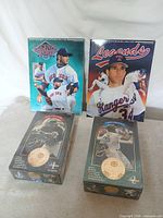 Lot overview showing both sealed hobby boxes and two magazines