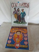 Front view of both tin signs side by side