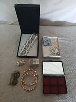 All items in lot including bracelet, pearls, earrings, pill box, trinket box, travel jewelry case and presentation boxes