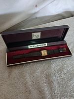 Watch in open Helbros box, full view