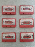 All six red Disney storyteller cassettes front view