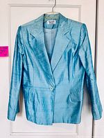 Front view of silk blazer on hanger
