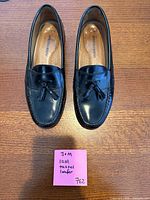 Top view Johnston & Murphy black tassel loafers size 10M