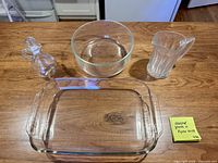 All four Pyrex clear glass pieces displayed on countertop