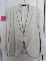 Front view of off-white Alan Flusser sport coat on hanger