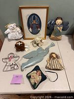 All nine angel-themed items arranged on tabletop