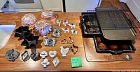 Overview of all bakeware items laid out on countertop