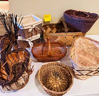 Group shot showing all ten baskets of various materials, colors and shapes