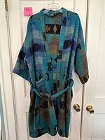 Front view of Bill Blass robe showing pattern, belt and pockets