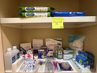 Overall view of shelving with all first-aid and medical supplies listed