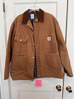 Front view showing overall jacket, pockets, collar and logo patch